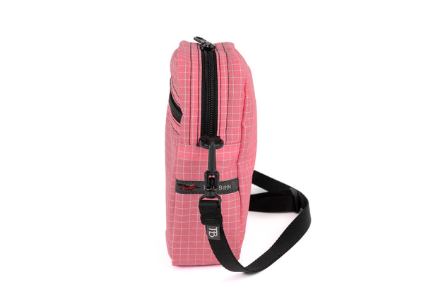 An Everyday Cubelet in Sakura Halcyon (pale pink with a white grid).